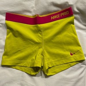 Yellow and pink Nike pro